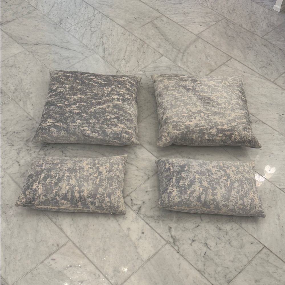Set of Four Gray Patterned Throw Pillows